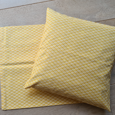 Housse de coussin jaune